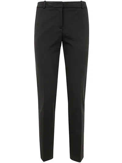 Kiltie Costes Slim Trousers In Black