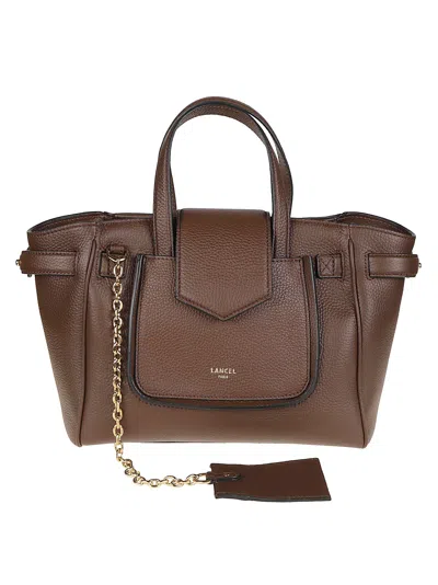 Lancel Thea Small Pebbled Cow Leather Handbag In Brown