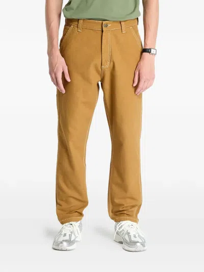 Lee Carpenter Contrast-stitch Trousers In Yellow