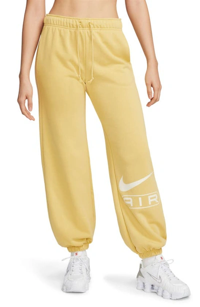 Nike Air Fleece Sweatpants In Saturn Gold/ Pale Ivory