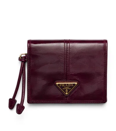 Prada Small Glossed Leather Wallet In Purple