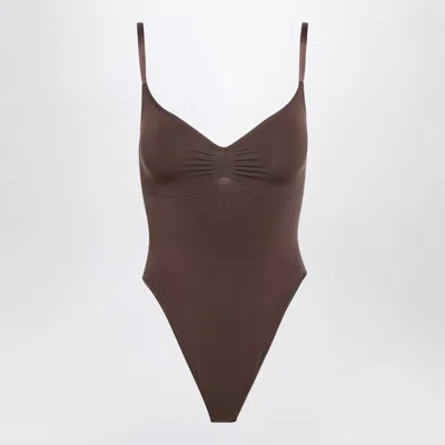 Skims Cocoa Brown Seamless Sculpt Thong Bodysuit In Burgundy