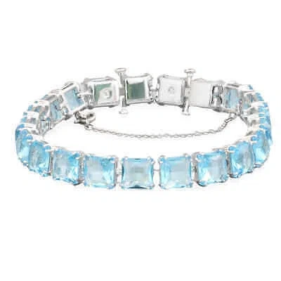 Pre-owned Swarovski Ladies Millenia Rhodium Plated Square Cut Bracelet In Blue