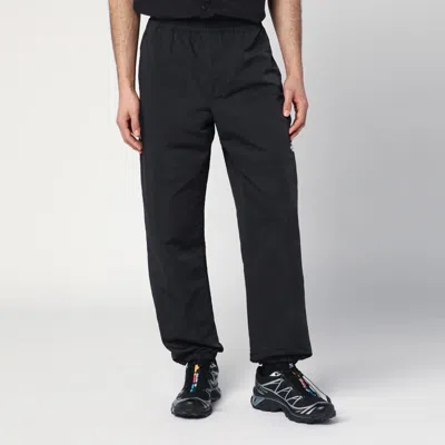 The North Face Black Trousers In Technical Fabric With Logo In Light Blue