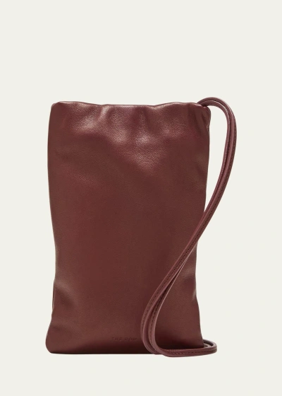 The Row Bourse Phone Case In Napa Leather In Burgundy