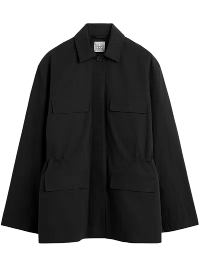 Totême Multi-pocket Organic Cotton Drawstring Waist Jacket With Button Front In Black