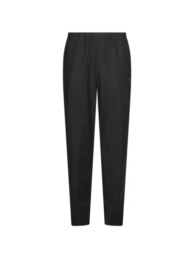 Undercover Elasticated-waist Logo-patch Trousers In Black