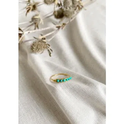 Une A Une Fine Gold-plated Ring With Six Turquoise Gemstones.
