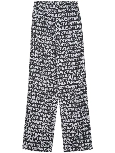 Vetements Cotton Logo-print Straight Trousers In Black