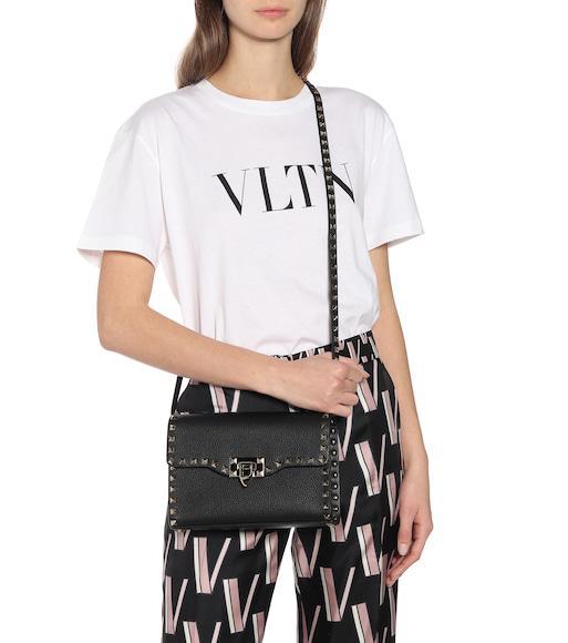 VALENTINO GARAVANI Grainy Calfskin Rockstud Flip Lock Flap Small Crossbody In Black