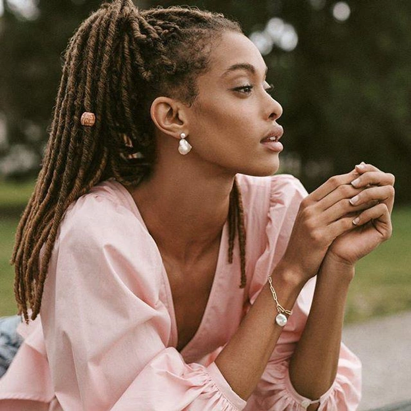 shopbop.com's Posts | Wearing: Mateo 14kt Yellow Gold Duality Pearl Drop Earrings; Staud Luna Flared-hem Cotton-blend Top In Pink