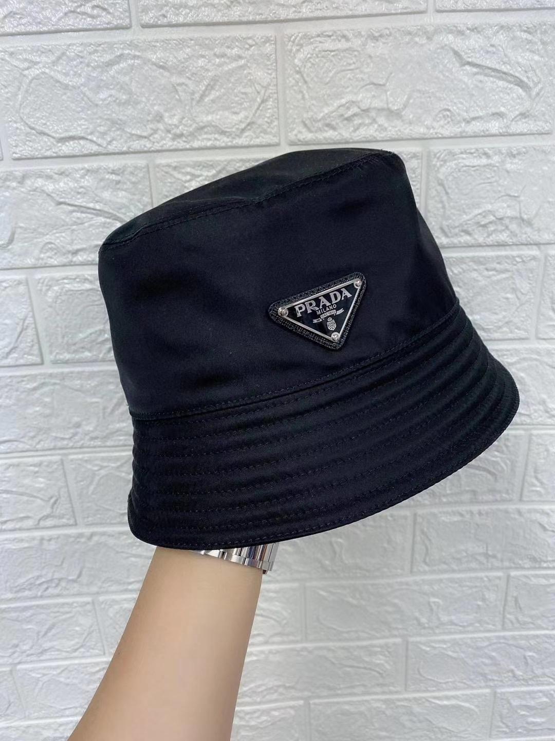PRADA Logo-embellished Shell Bucket Hat In Black
