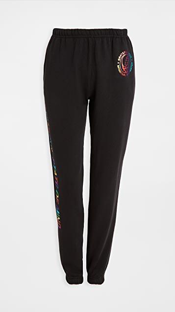 AMO Denim Sleeveless Babe Tee In Vintage Black In Purple