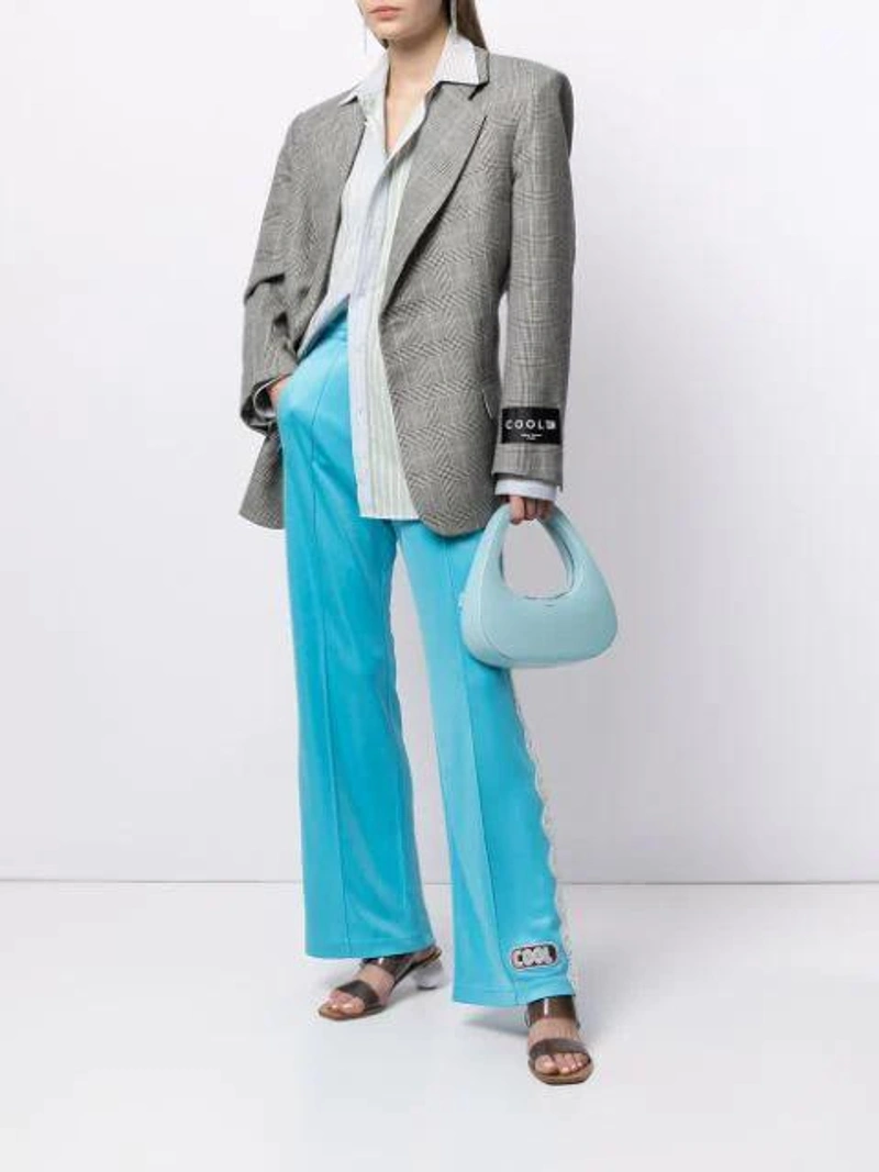 Farfetch's Post | Wearing: Cool Tm Cool T.m Turquoise Lace Sweatpants; Jw Anderson Green Patchwork Striped Cotton Shirt; Cool Tm Check Linen-wool Blend Blazer In Black