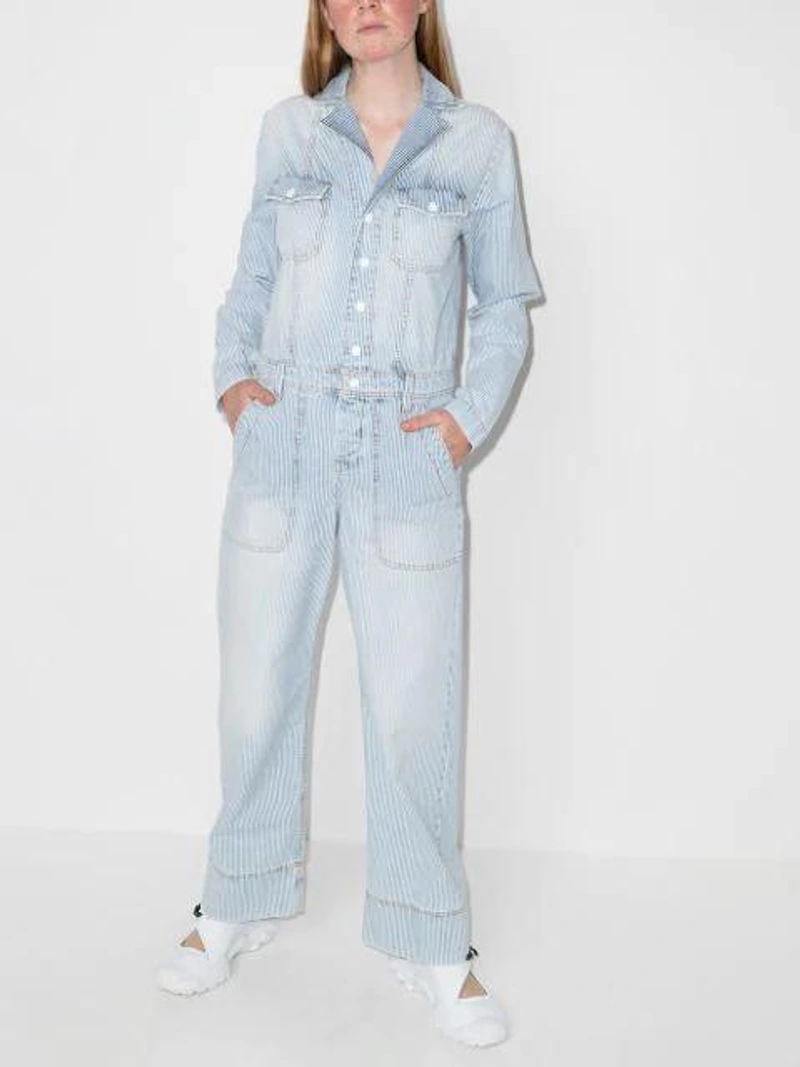 Farfetch's Post | Wearing: Mira Mikati Striped Roller Skate Denim Jumpsuit In Blue; Staud Yellow And White Sasha Tweed Shoulder Bag; Adidas Originals Buckle-fastening Oversize-sole Sandals In White