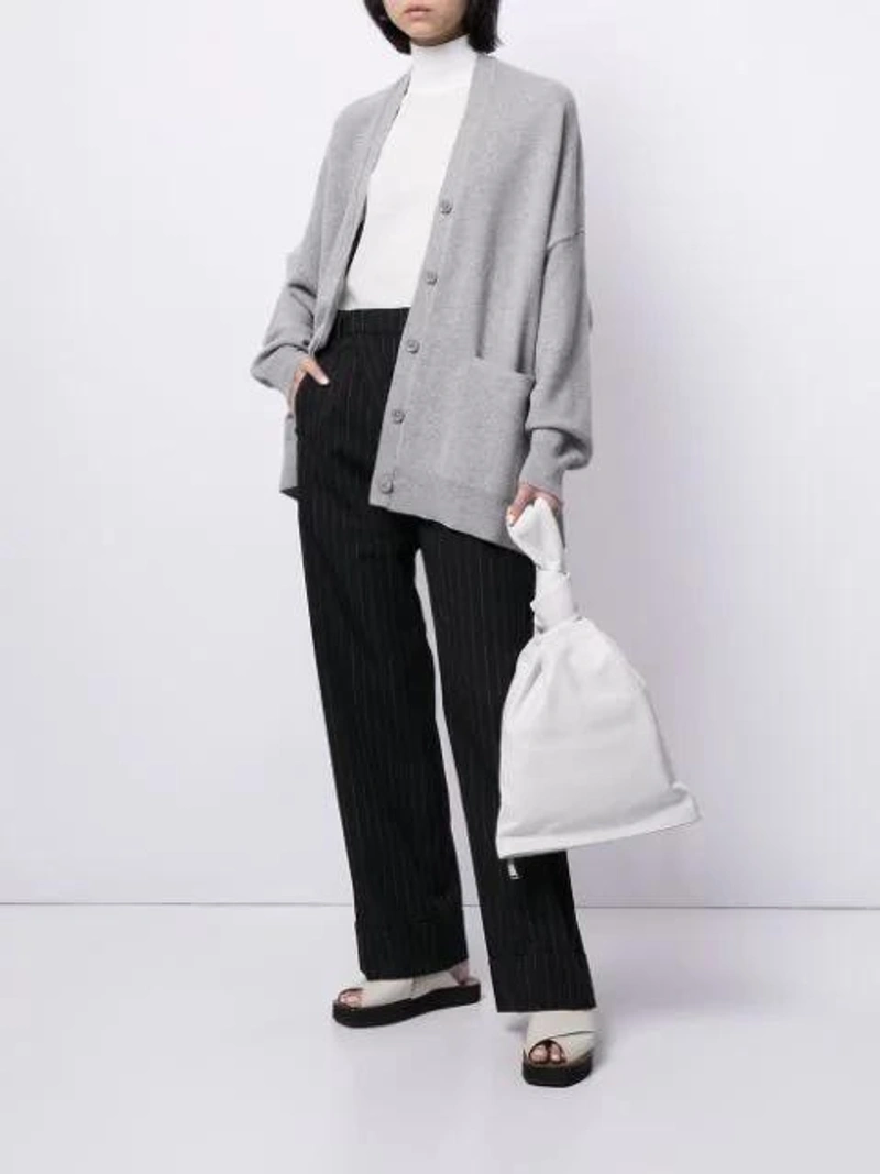 Farfetch's Post | Wearing: Extreme Cashmere Tokio Oversized Cardigan In Grey; Bottega Veneta White Ladies Bv Twist Knotted Handle Clutch Bag; Tol Eyewear Rectangular-frame Sunglasses In Black