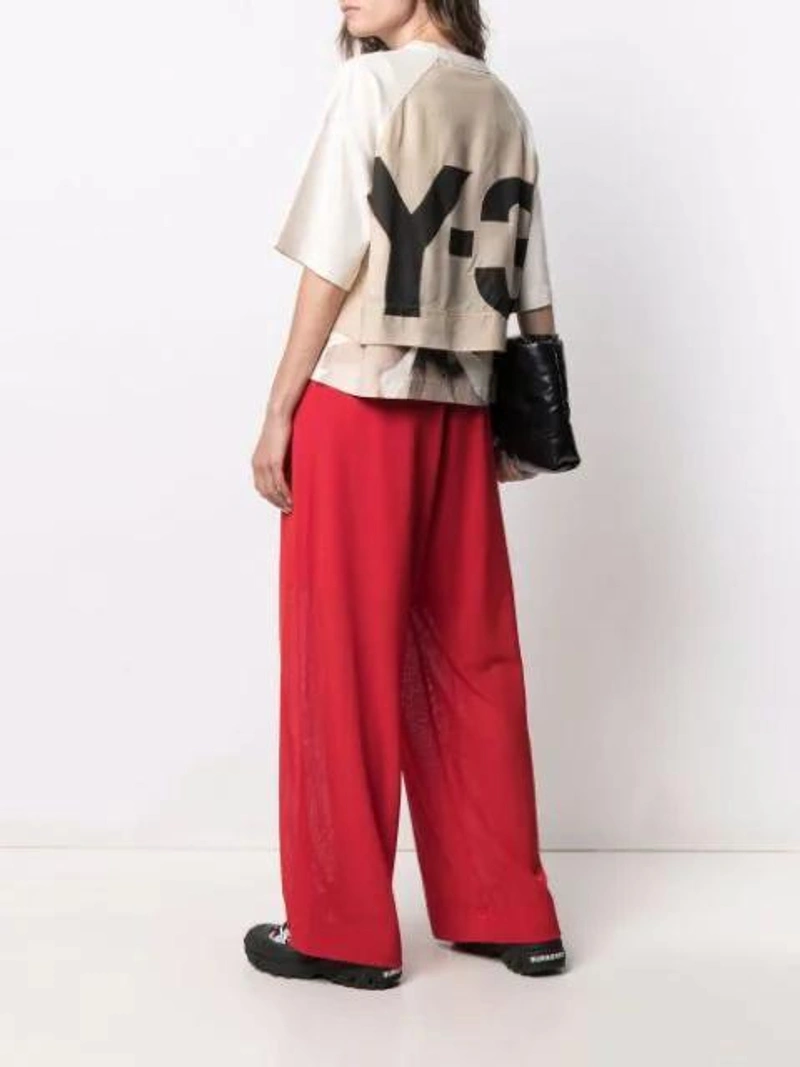 Farfetch's Post | Wearing: Y-3 Logo-print Organic Cotton T-shirt In Neutrals; Y-3 Adidas Y3 Cropped Drawstring-waist Joggers In Red