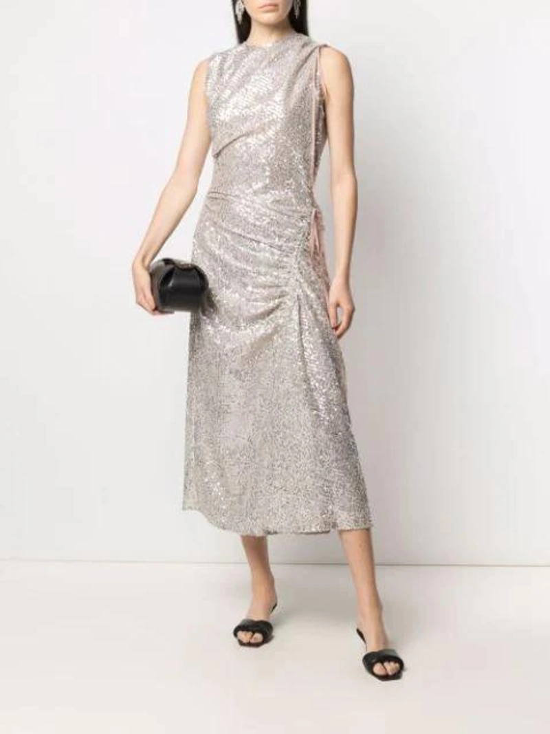 Farfetch's Post | Wearing: N°21 Silver Sequin Ruched Dress; Yuzefi Loaf Shoulder Bag In Black; Isabel Marant Silver Metallic Gem Drop Earrings