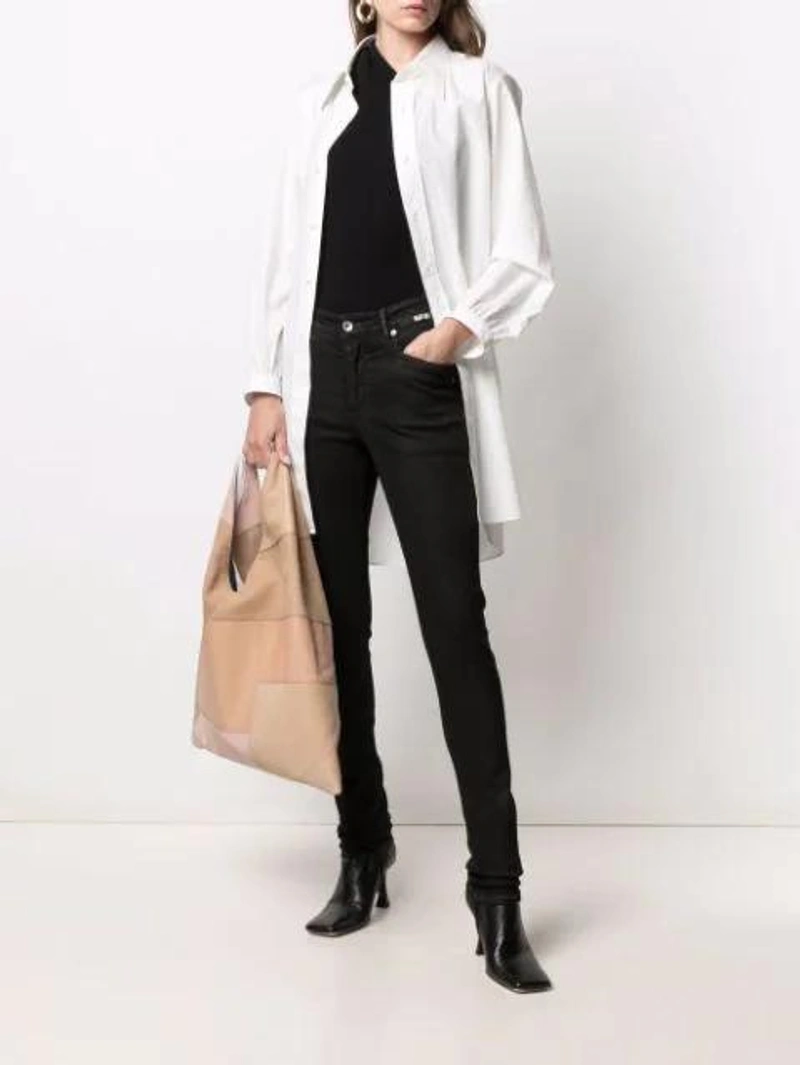 Farfetch's Post | Wearing: Rick Owens High Rise Skinny Jeans In Black; Rick Owens Lilies Cotton-blend One-shoulder Top In Black; Mm6 Maison Margiela Md Japanese Patchwork Leather Tote Bag In H8694 Nude