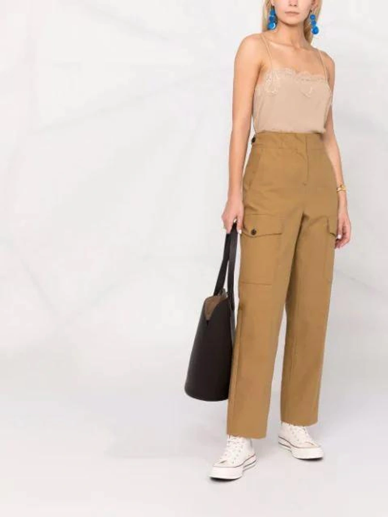 Farfetch's Post | Wearing: Alighieri The Wasteland 24kt Gold-vermeil Ring; Converse Off-white Chuck 70 High Sneakers In Light Beige; Semicouture Lace-trimmed Camisole Top In Neutrals