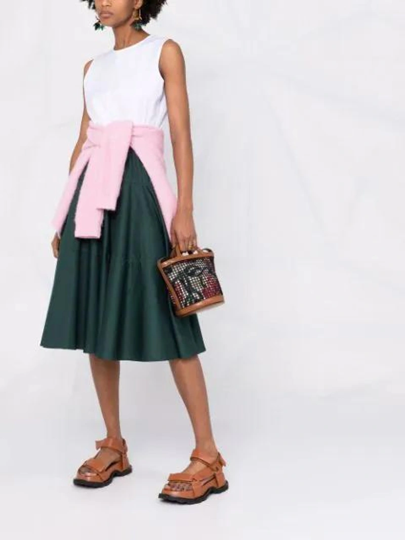 Farfetch's Post | Wearing: Marni Two-tone Midi Dress In White; Ganni Button Front V-neck Cardigan In Pink; Marni Summer Floral Net Tote Bag In Black
