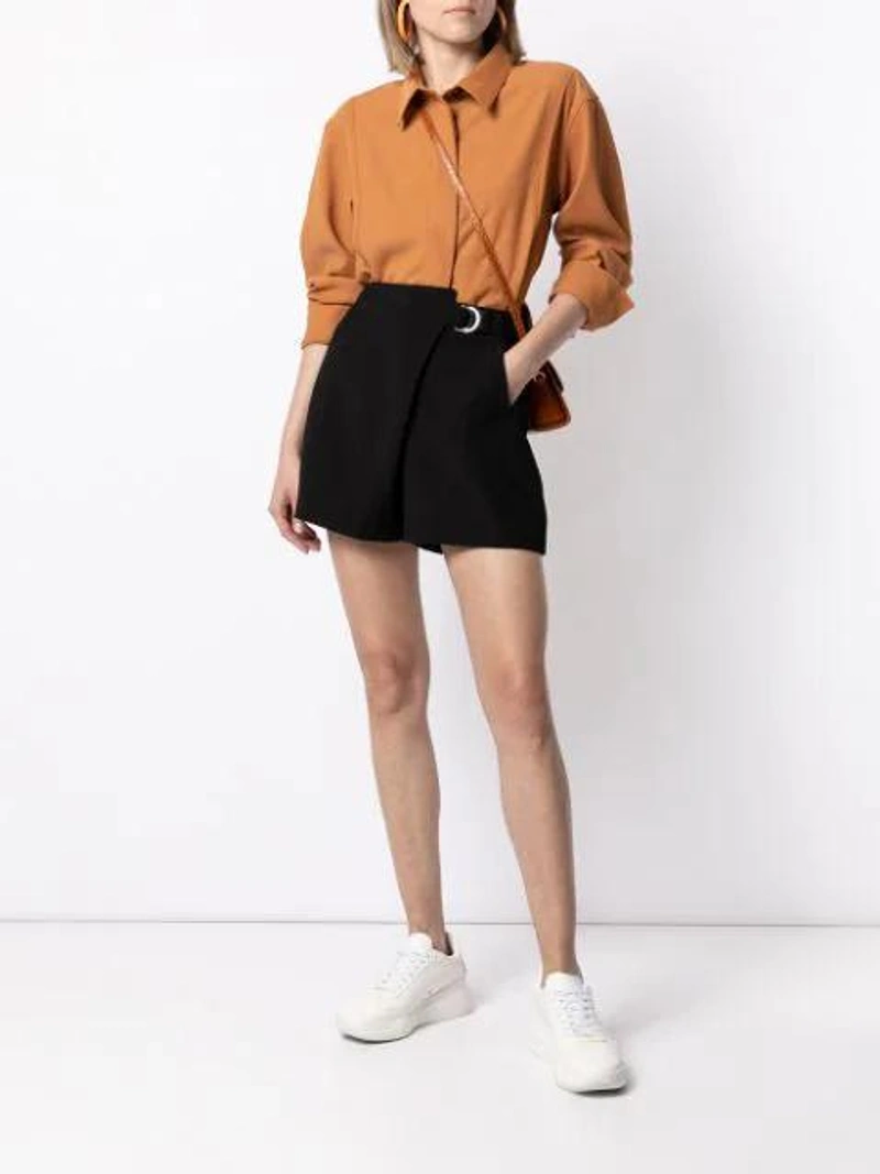 Farfetch's Post | Wearing: Goodious Twill Concealed-button Shirt Jacket In Brown; Goodious Asymmetric Belted Shorts In Black