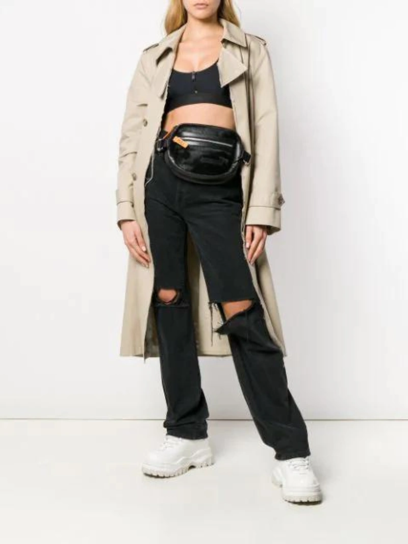 Farfetch's Post | Wearing: Heron Preston Zip-up Front Sleeveless Crop Top In Black; Re/done 【sale】re Done2021秋季女黑色棉质高腰牛仔裤nap/net-a-porter In Black; Heron Preston Black Ponyskin Leather Belt Bag