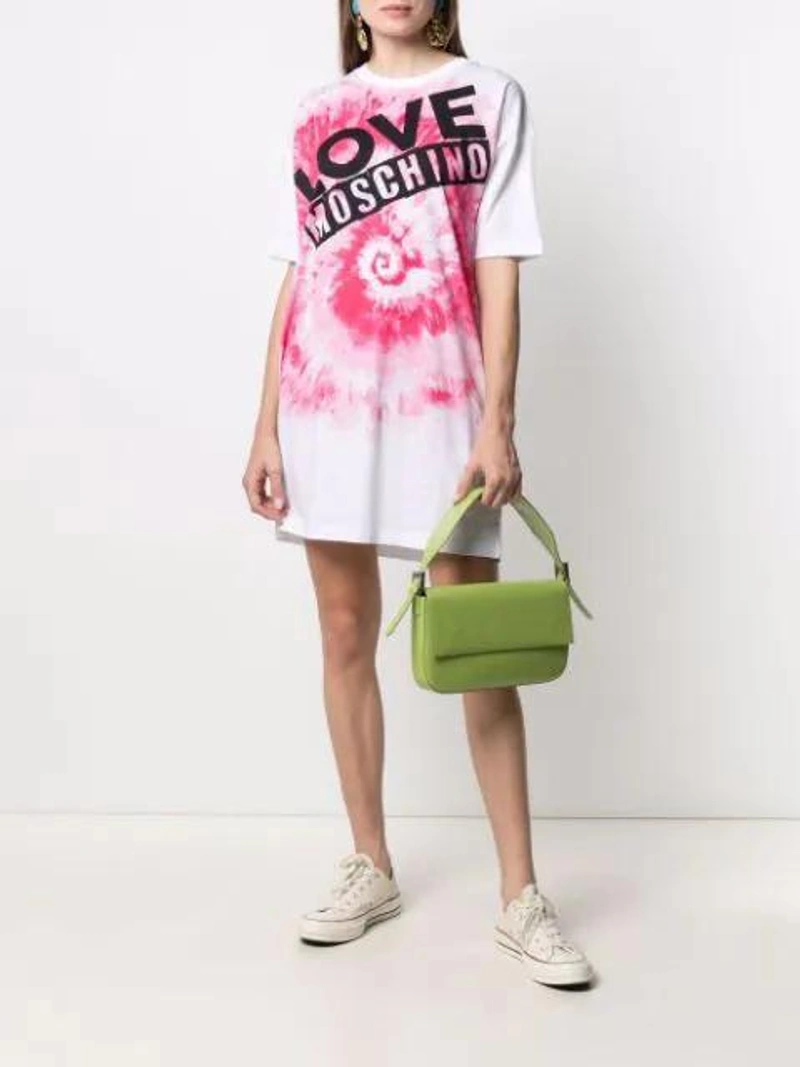 Farfetch's Post | Wearing: Converse Chuck 70 Classic Low-top Sneakers In Light Beige; Love Moschino Logo-print T-shirt Dress In White; By Far 'manu' Semi Patent Leather Baguette Shoulder Bag In Green