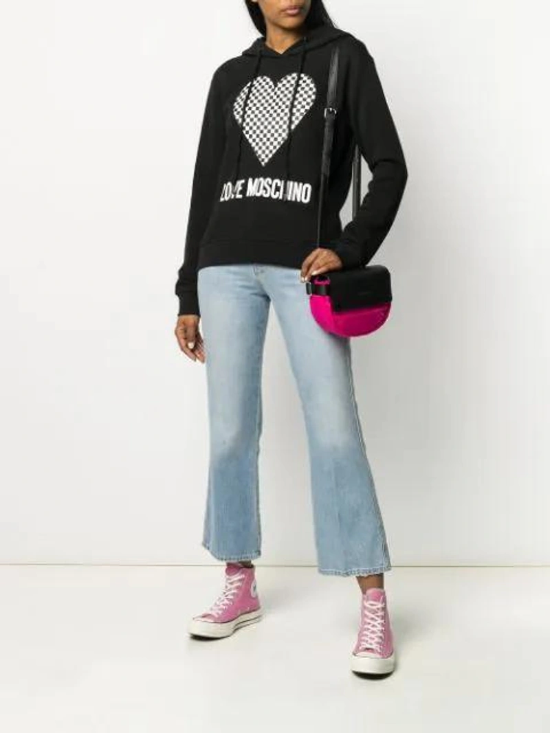 Farfetch's Post | Wearing: Love Moschino Checkered Heart-print Hooded Sweatshirt In Black; Frame Le Sylvie Kick Flare Jeans In Blue; Karl Lagerfeld Two-tone Logo Crossbody Bag In Pink