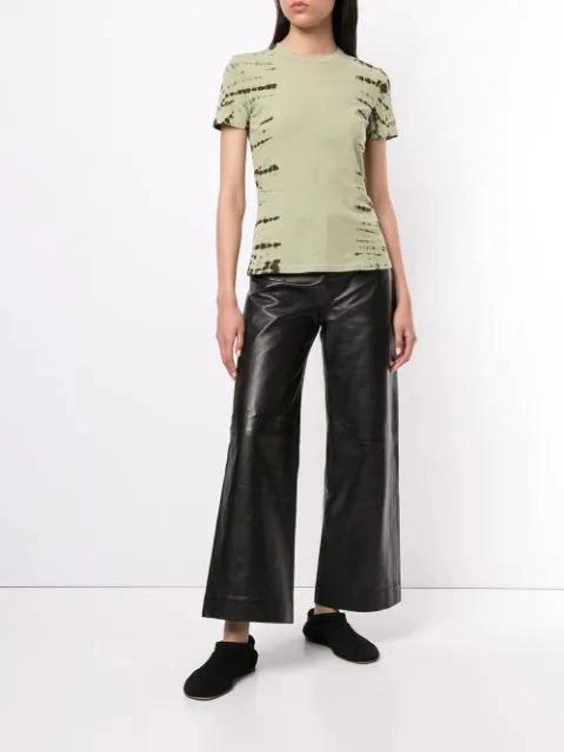 Farfetch's Post | Wearing: Proenza Schouler White Label Regular-fit Wide-leg High-rise Leather Culottes In Black; Proenza Schouler White Label Tie-dye T-shirt In Green