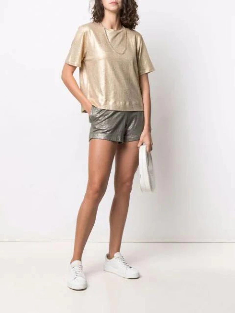 Farfetch's Post | Wearing: Majestic Metallic Shortsleeved Top In Gold; Majestic Metallic Paperbag-waist Linen-blend Shorts In Green; Saint Laurent New Wave Sl 276 Sunglasses In Black