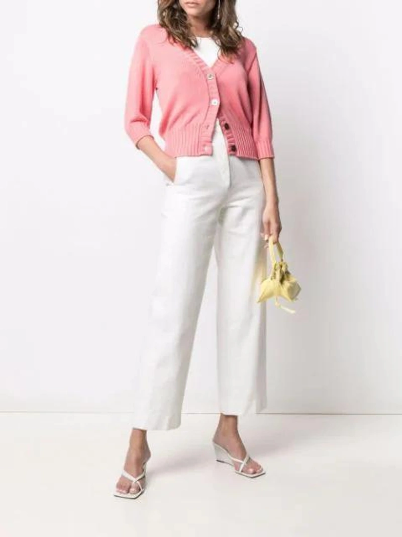 Farfetch's Post | Wearing: Drumohr Crop-sleeves Cotton Cardigan In Pink; Agolde White Rib High Neck Tank Top; Lvir Stitches Straight-leg Trousers In Ivory