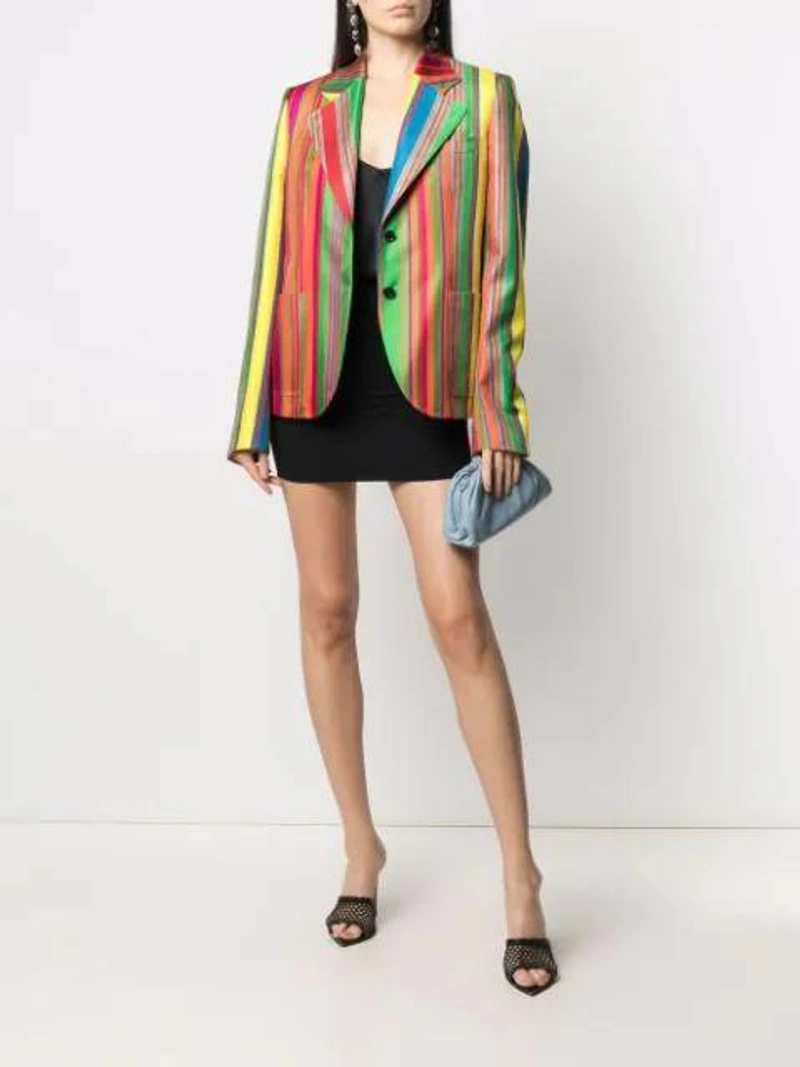 Farfetch's Post | Wearing: Versace Stripe-print Blazer In Orange; Ganni Heavy Satin Slip Top In Black; Versace Sable Viscose Mini Skirt W/gold Detail In Black
