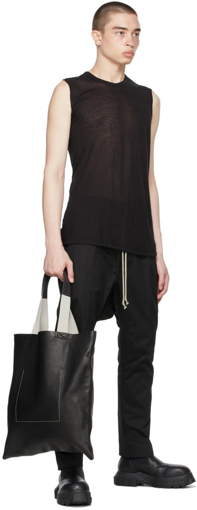 SSENSE's Post | Wearing: Rick Owens Black Basic Tank Top In 09 Black; Rick Owens Drawstring Virgin Wool-blend Slim-leg Trousers In Black; Rick Owens Black Large Signature Tote In 0961blkoys