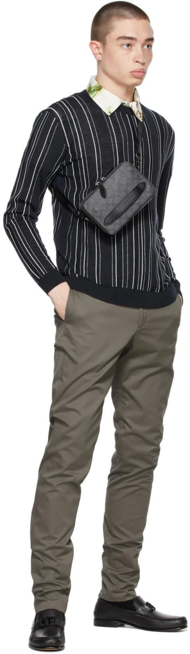 SSENSE's Post | Wearing: Ferragamo Slim-fit Tailored Trousers In Green; Ferragamo Floral-print Short-sleeve Shirt In Green; Giorgio Armani Navy Virgin Wool Intarsia Stripe Sweater In Pzd3 Fantas