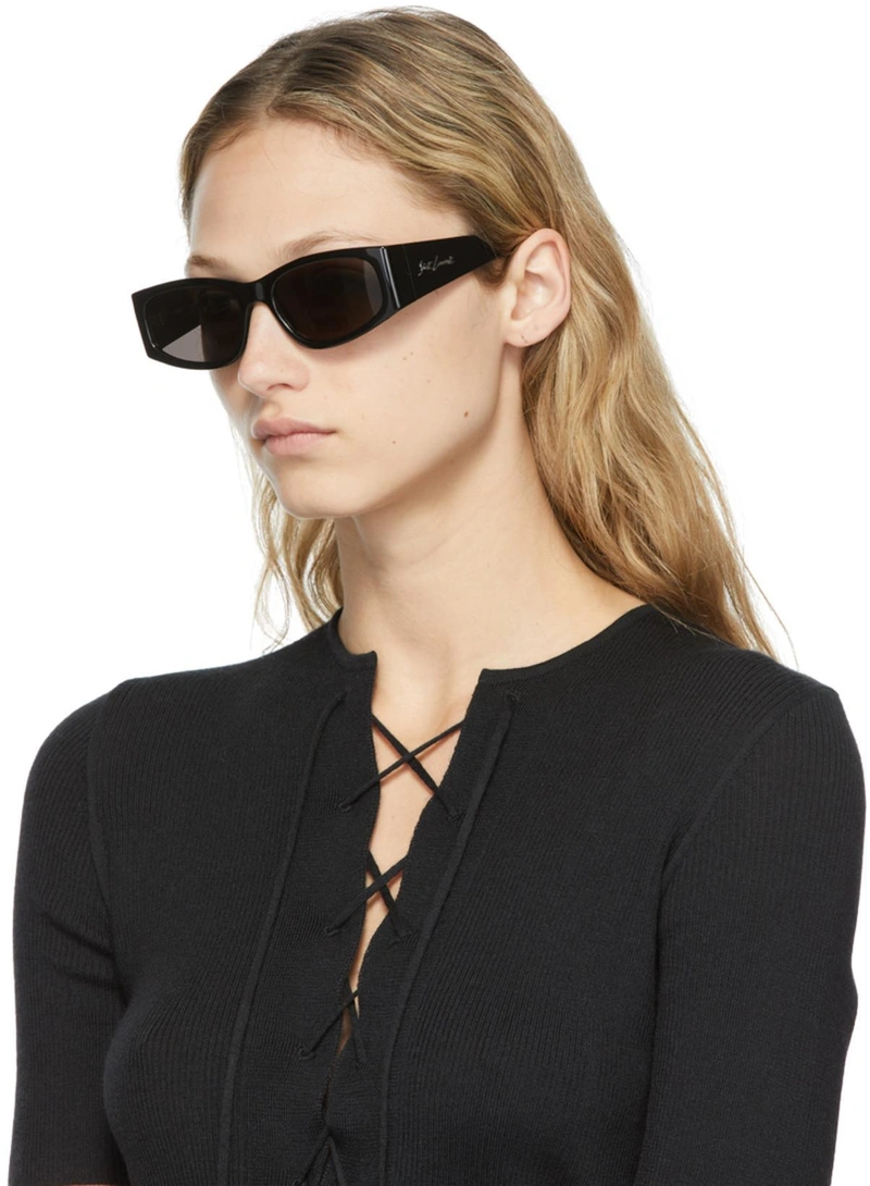 SSENSE's Post | Wearing: Saint Laurent Lace-up Wool, Cashmere And Silk-blend Top In Black; Saint Laurent Black Sl 329 Rectangular Sunglasses In 001 Black