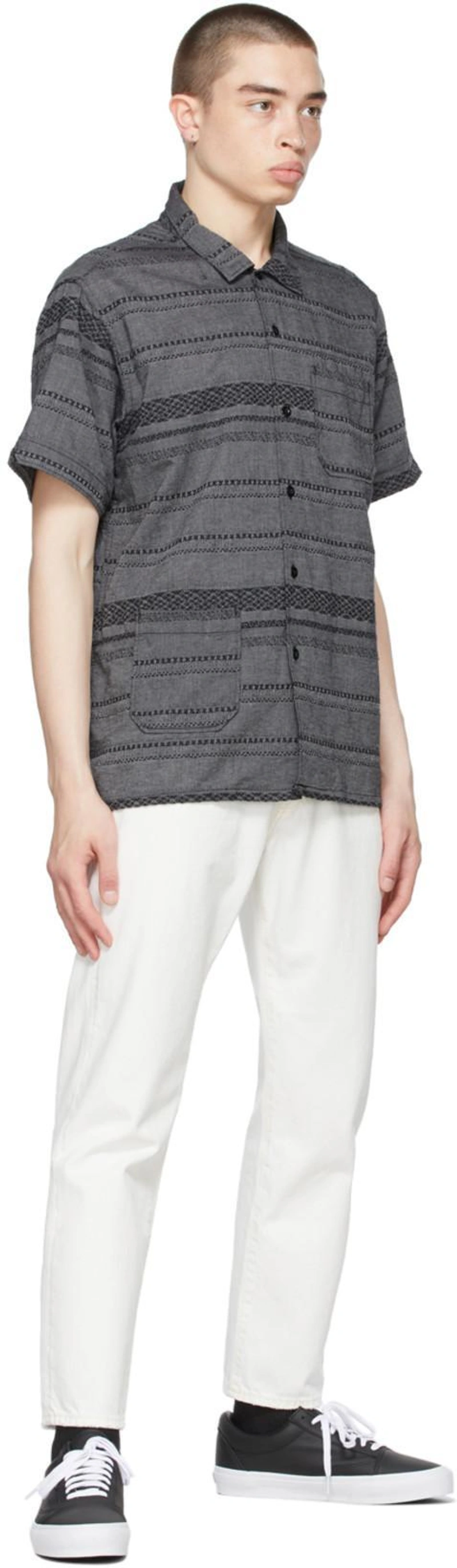 SSENSE's Post | Wearing: Acne Studios North White Jeans In White Denim; Engineered Garments Grey Striped Camp Shirt In Kt022 Grey; Vans Black Leather Old Skool Ns Vlt Lx Sneakers In Black Black