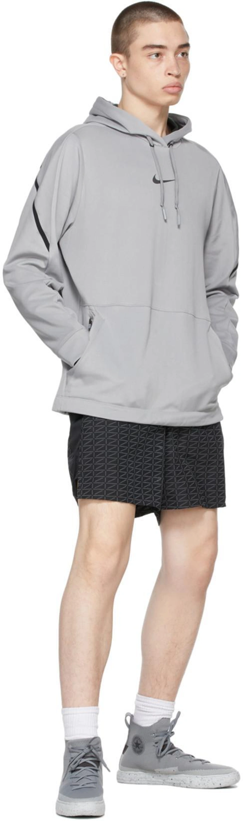 SSENSE's Post | Wearing: Nike Grey & Black Pro Pullover Hoodie In Particle Grey,black; Nike Black Run Logo Shorts In Black/white; Converse Grey Chuck Taylor All Star Crater Knit High Sneakers In Hi Limestone Grey