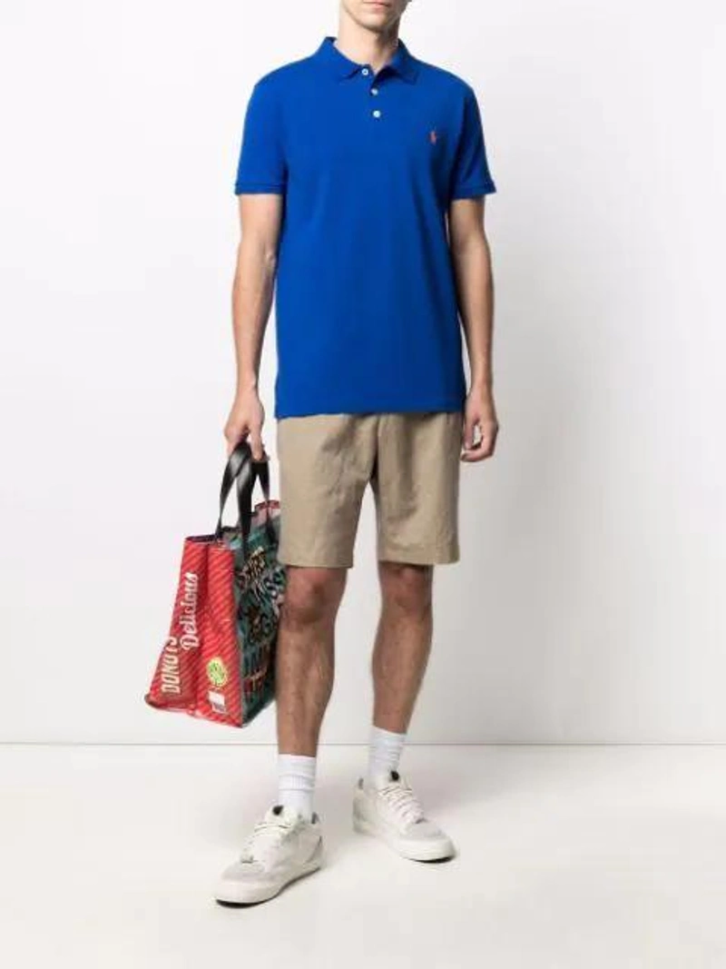 Farfetch's Post | Wearing: Polo Ralph Lauren Embroidered Logo Polo Shirt In Blue; Comme Des Garçons Shirt Delicious Logo Tote In Purple; Off-white Omri008f20pla0016003 Square-frame Sunglasses In Black
