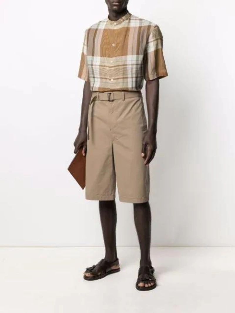 Farfetch's Post | Wearing: Lemaire Brown Cotton & Linen Short Sleeve Shirt In Neutrals; Lemaire Straight-leg Jeans In Blue; Acne Studios Square-toe Grained-leather Derby Shoes In Black