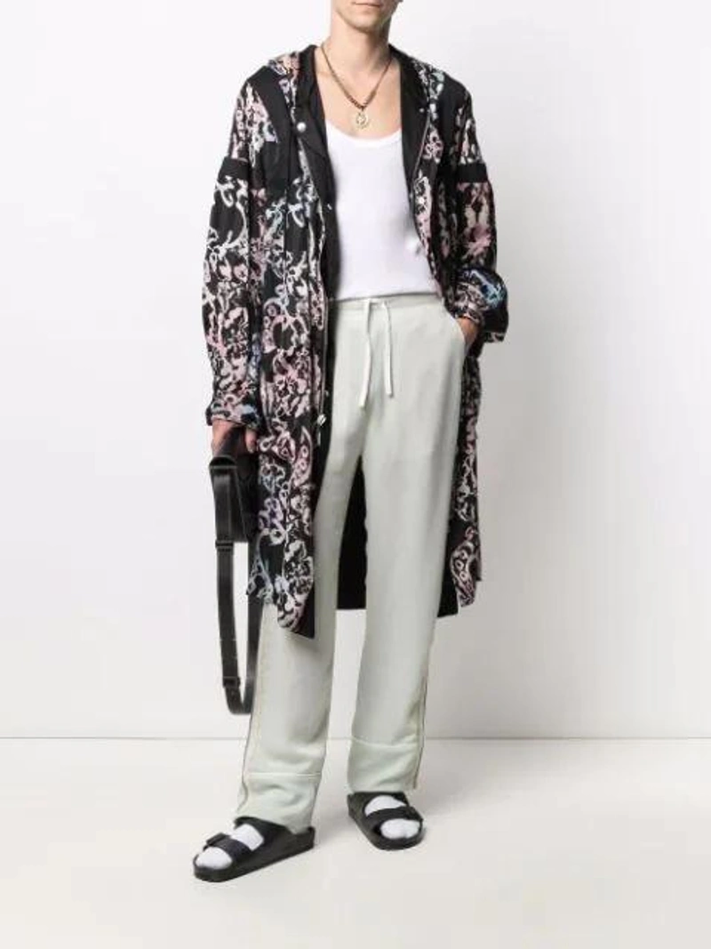 Farfetch's Post | Wearing: Koché Drawstring High-waisted Trousers In Green; Alix Nyc Off-shoulder Button Decoration Top In Black; Alexander Wang Small Attica Leather Multi-zip Crossbody Bag In Black