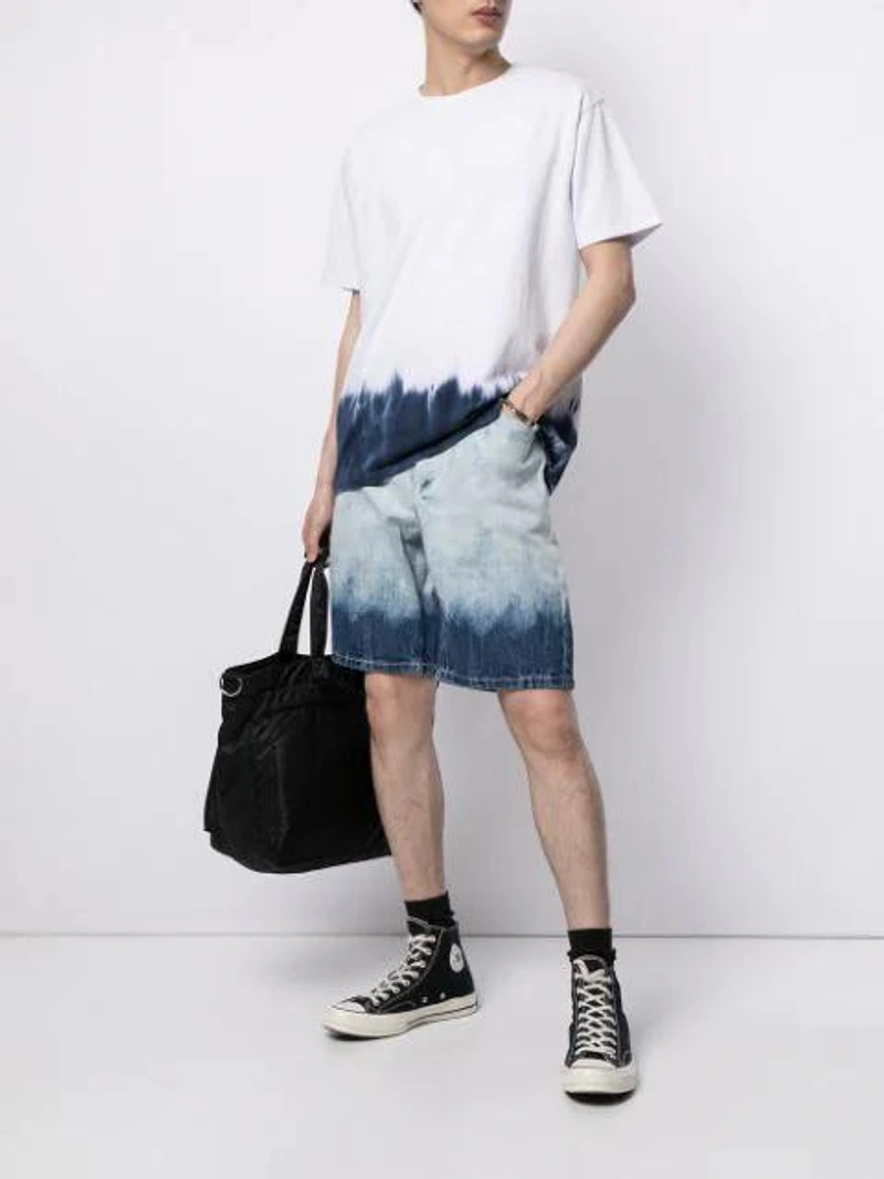Farfetch's Post | Wearing: Converse 1970s Chuck Taylor All Star Canvas High-top Trainers In Black; Five Cm Dip-dye Denim Shorts In Blue; Five Cm Dip-dye T-shirt In White