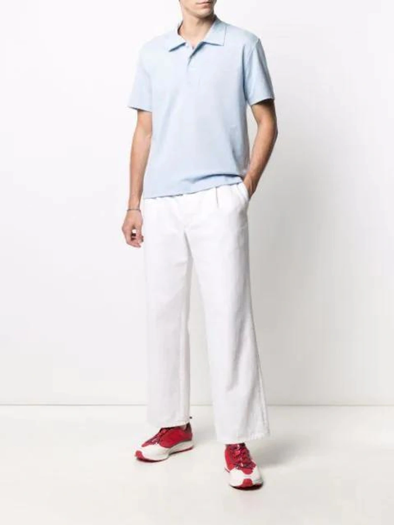Farfetch's Post | Wearing: Emanuele Bicocchi Curb Braided Bracelet In Silver; Nike X Gyakusou Red Zoom Pegasus 36 Trainers; Viktor & Rolf Short-sleeved Polo Shirt In Blue