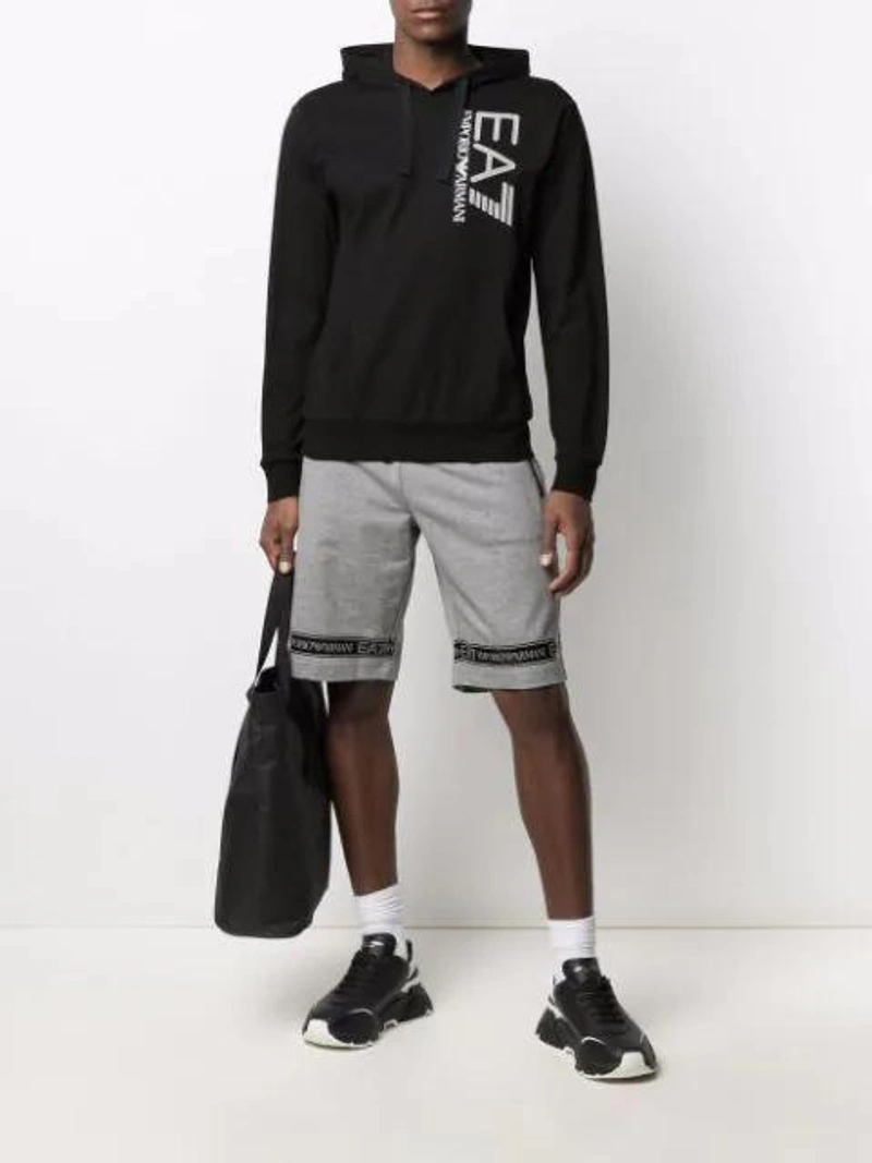 Farfetch's Post | Wearing: Dolce & Gabbana Dolce And Gabbana Black And White Daymaster Sneakers In Black White; Ea7 Logo-print Cotton Track Shorts In Grey; Ea7 Logo-print Cotton Hoodie In Black