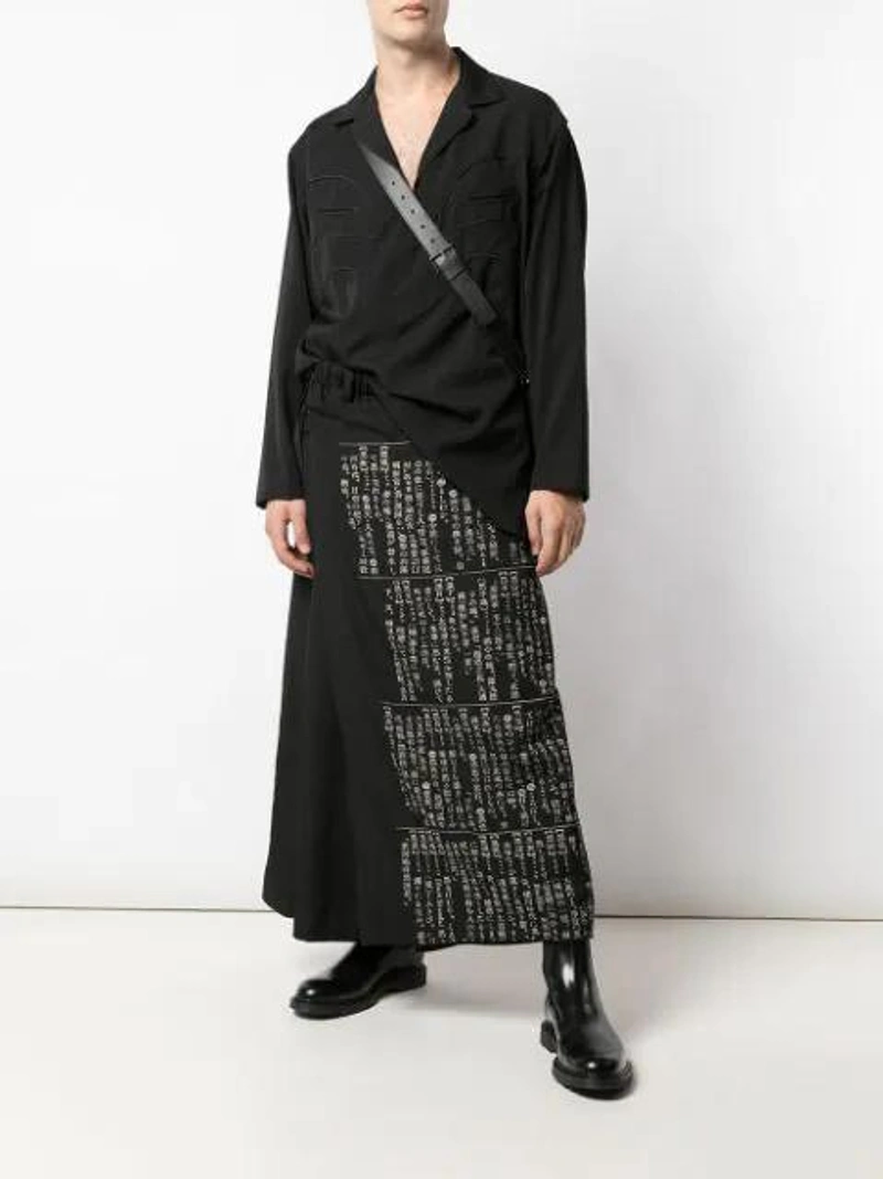 Farfetch's Post | Wearing: Yohji Yamamoto Cord Piping Shirt In Black; Yohji Yamamoto Wide Wrap Kanji Pants In Black