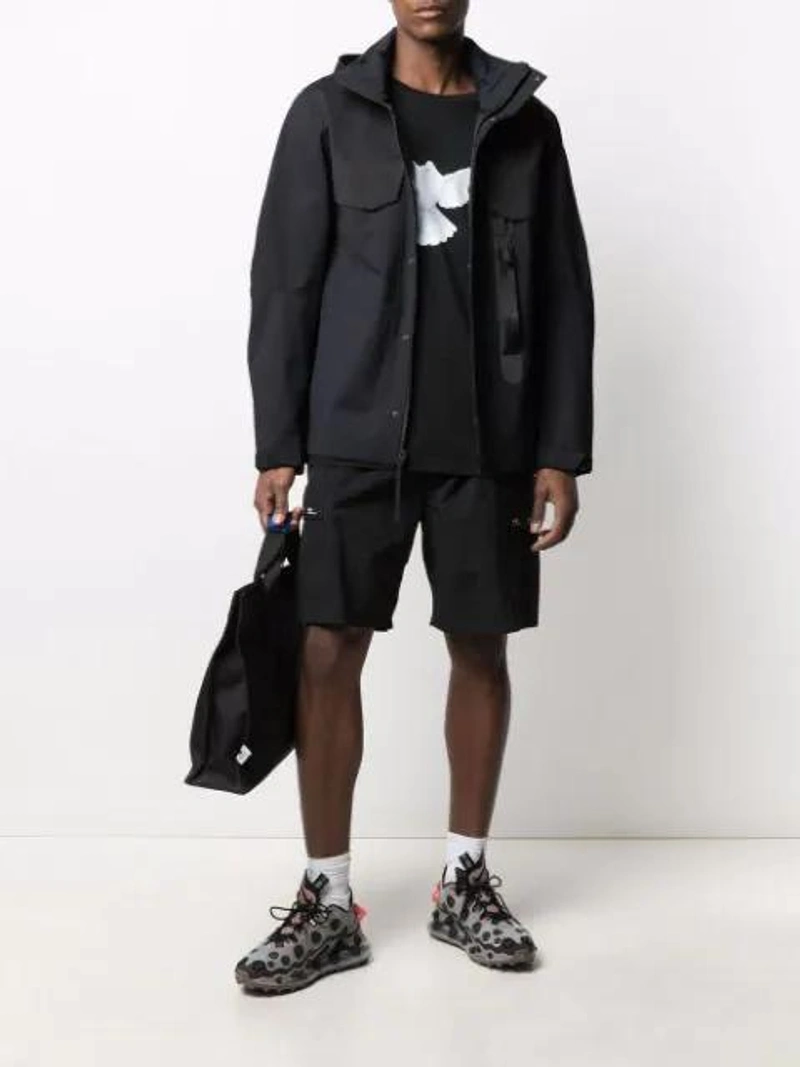 Farfetch's Post | Wearing: Nike Hooded Zip Jacket In Black; 3paradis X Homecoming Bird-print T-shirt In Black; Ader Error Logo Holdall In Black