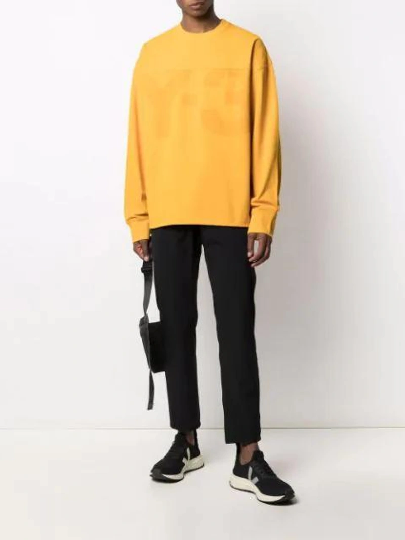 Farfetch's Post | Wearing: Y-3 Oversized Logo-print Cotton And Linen-blend Piqué Sweatshirt In Yellow; Gramicci 3layer Redrock Trousers In Black; Y-3 Ch3 Logo-print Shoulder Bag In Black