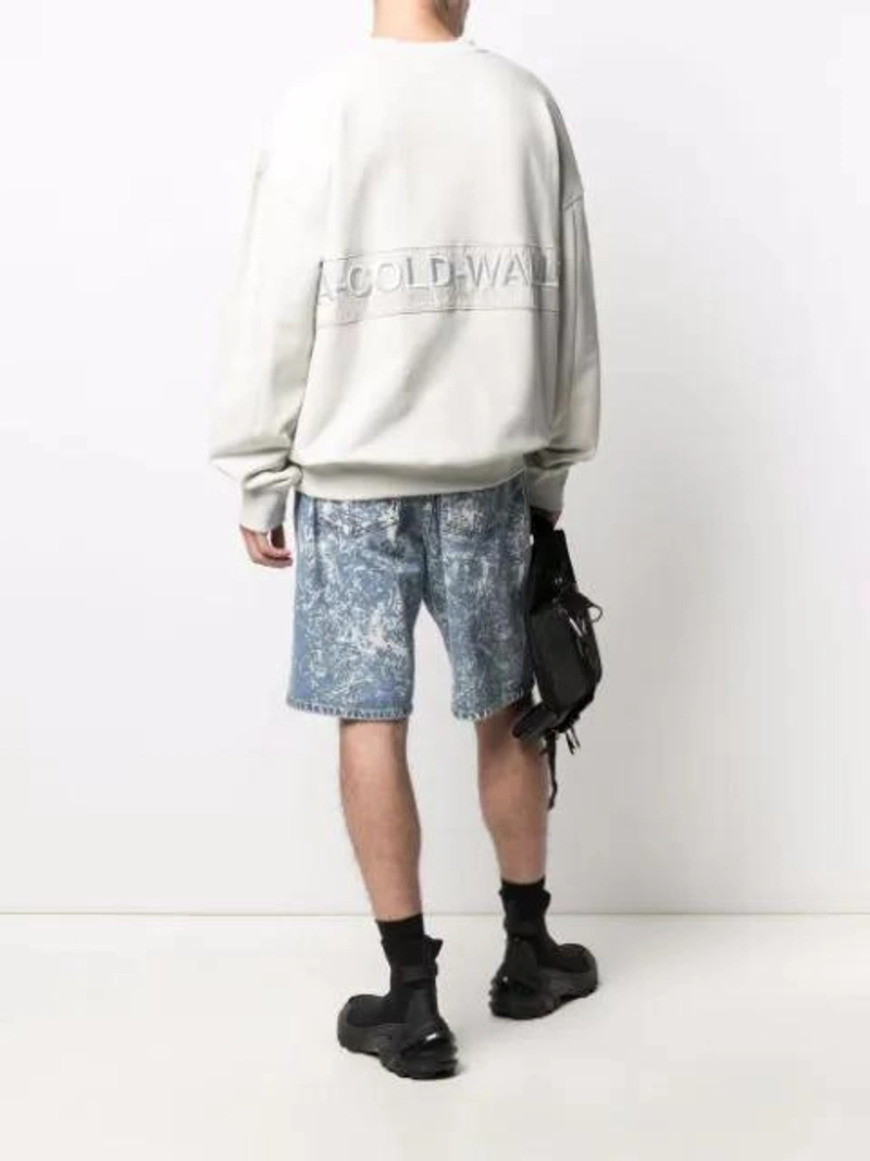Farfetch's Post | Wearing: A-cold-wall* Embroidered-logo Oversize Jumper In White; Msgm Denim Shorts With Drawstring; Indispensable Black Armour Aurora Cross Body Bag