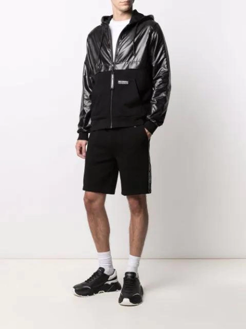 Farfetch's Post | Wearing: Dolce & Gabbana Dolce And Gabbana Black And White Daymaster Sneakers; Karl Lagerfeld Ikonik Karl-patch Track Shorts In Black; Joseph Perfect Jersey T-shirt In White