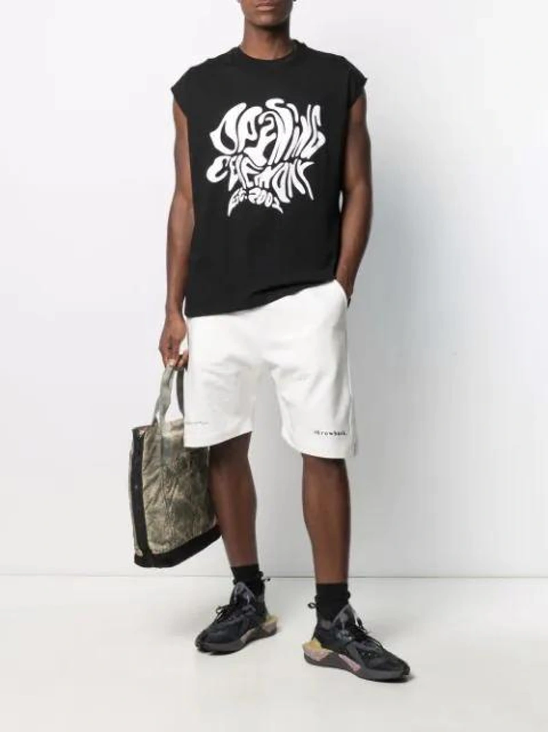 Farfetch's Post | Wearing: Opening Ceremony Black Melted Logo Tank Top In Black Whit; Throwback. Logo Drawstring Shorts In White